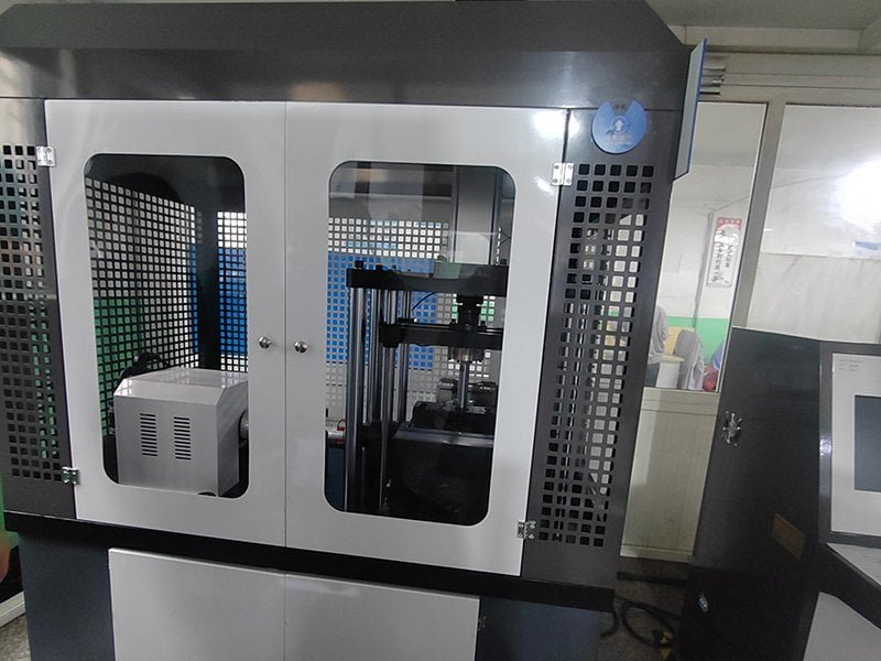Fatigue durability testing machine simulating repeated bushing movement