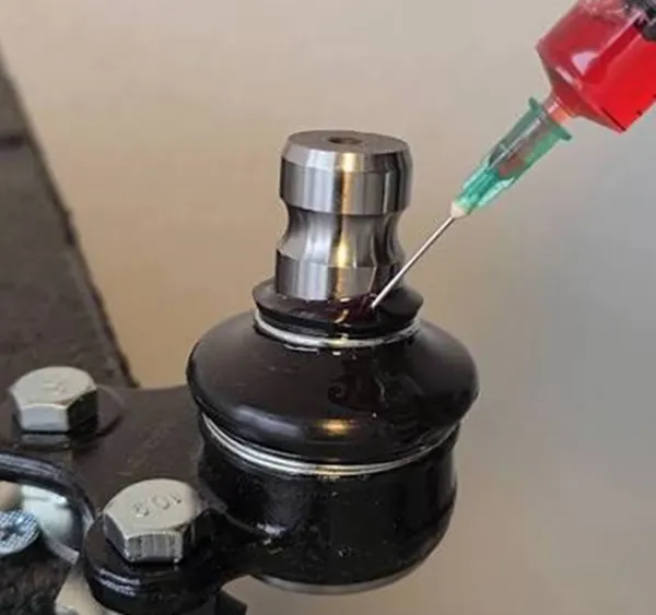 Ball joint greasing procedure and grease type selection
