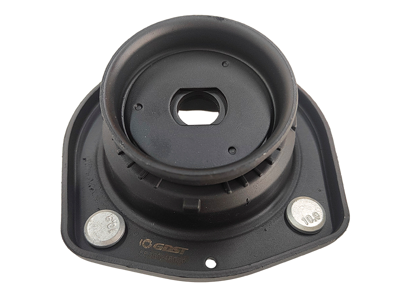 Rear rubber strut mount for vibration isolation in a non-steering rear suspension