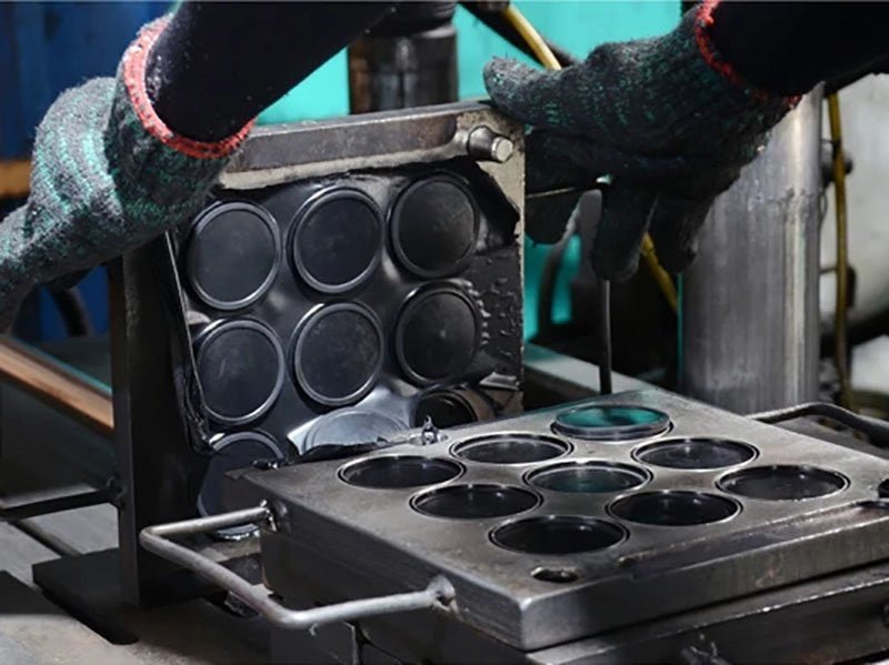 Controlled cooling and demolding of molded rubber-to-metal parts