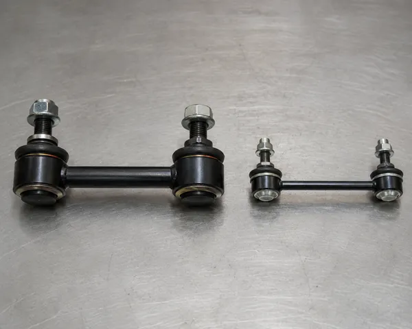 Two different stabilizer links side-by-side, one heavy-duty and one for a passenger car
