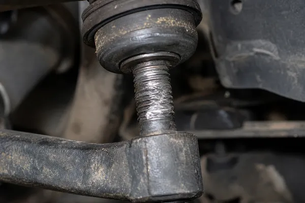 Sway bar link threads showing galling from loose installation